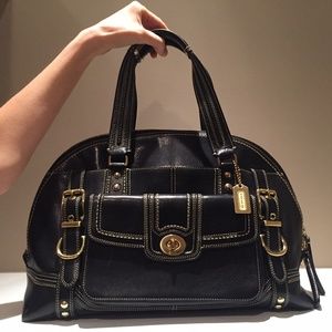 Coach black and gold handbag